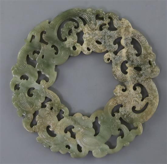 A Chinese archaistic celadon jade disc, D. 23.2cm